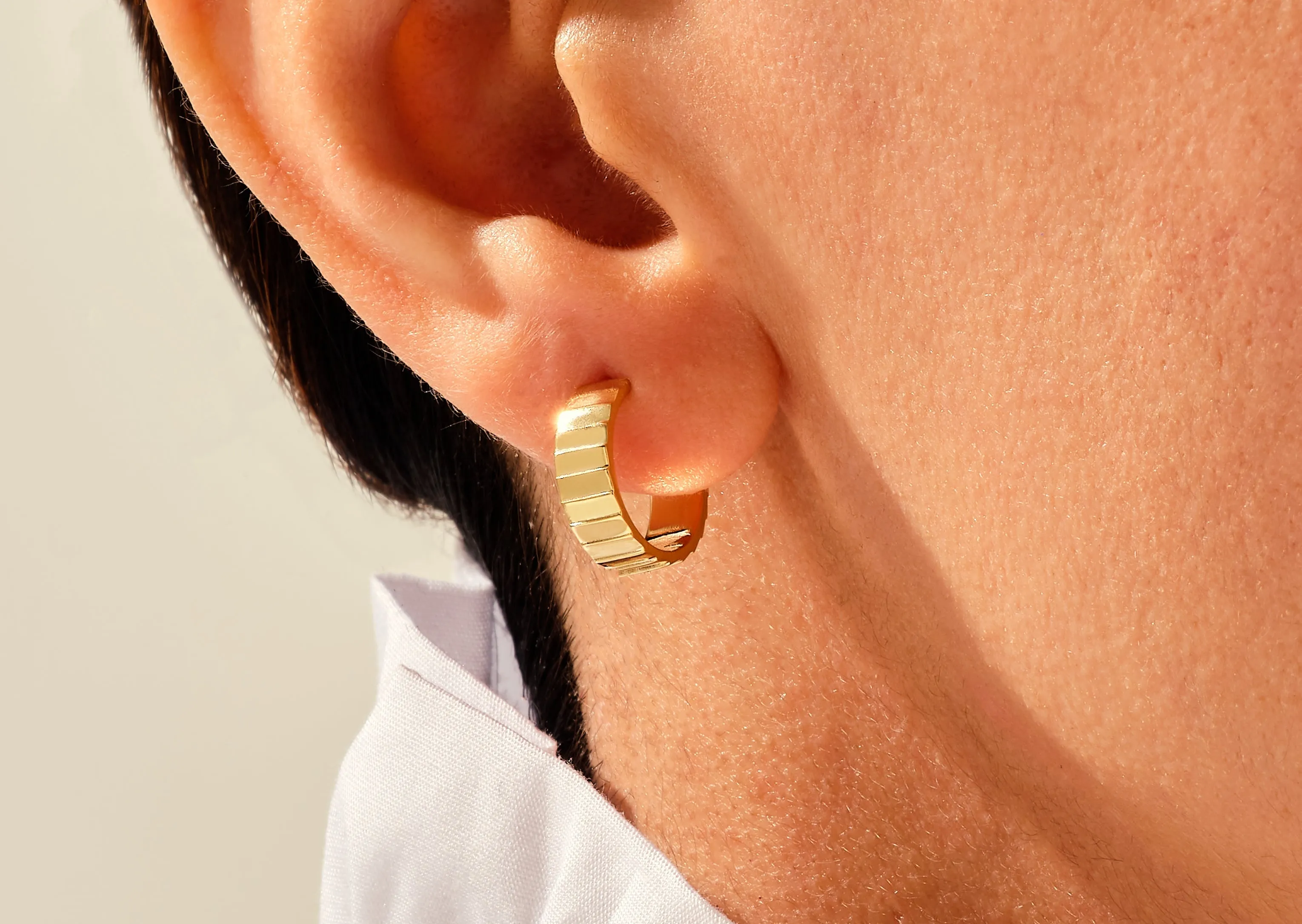 14k Gold Infinity Huggie Earrings