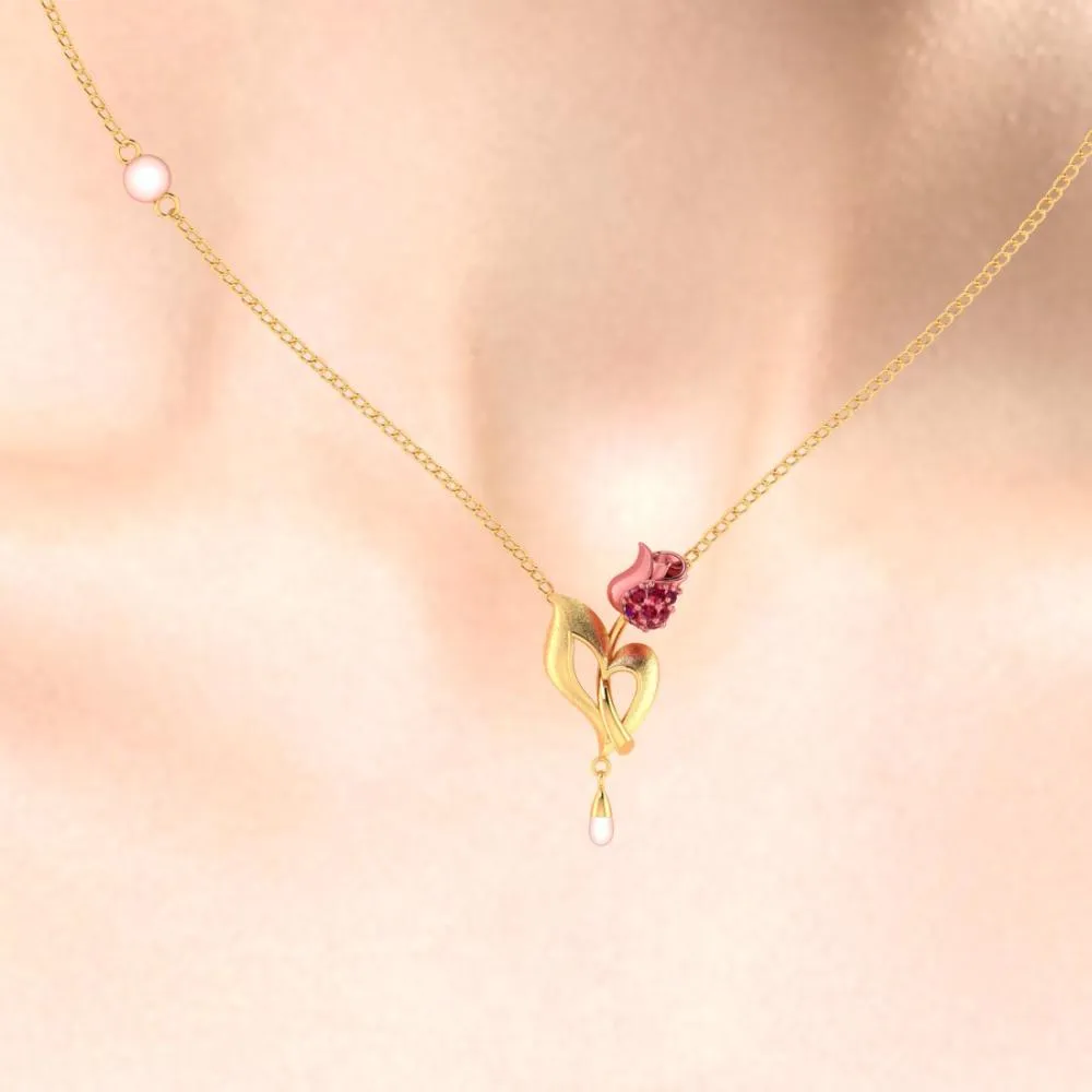 14k Gold Necklace With A Yellow Flower Design And A Pearl Accent