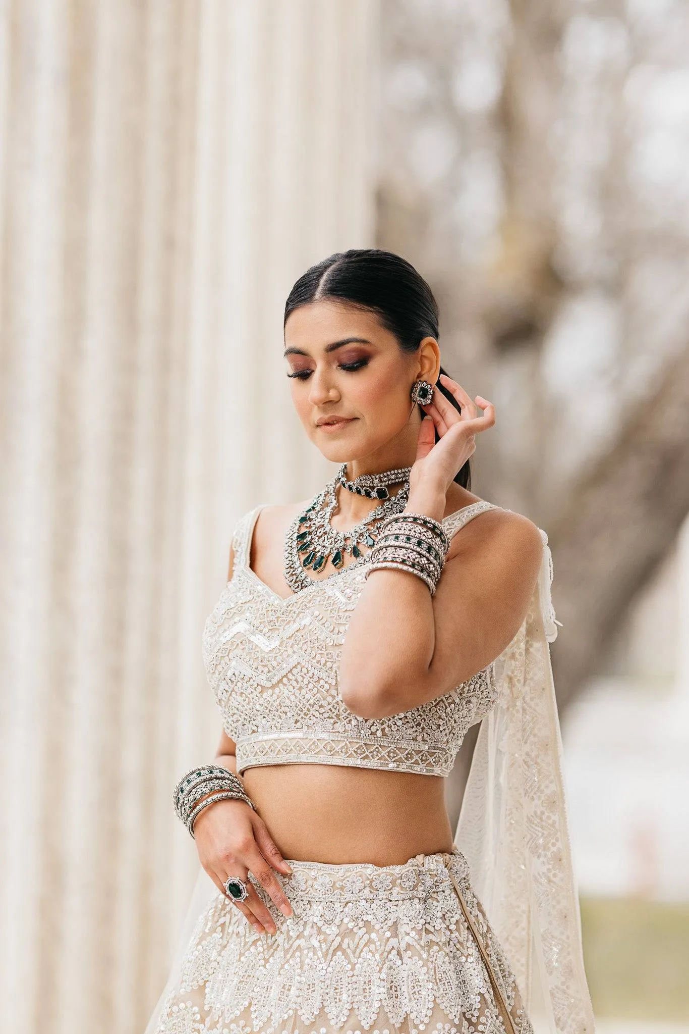 Ashma - Multilayer Rhodium Plated Silver Finish & Emerald Green Bridal Set