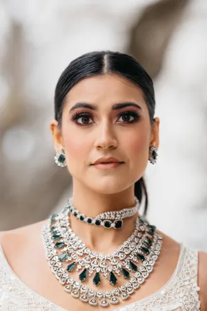 Ashma - Multilayer Rhodium Plated Silver Finish & Emerald Green Bridal Set