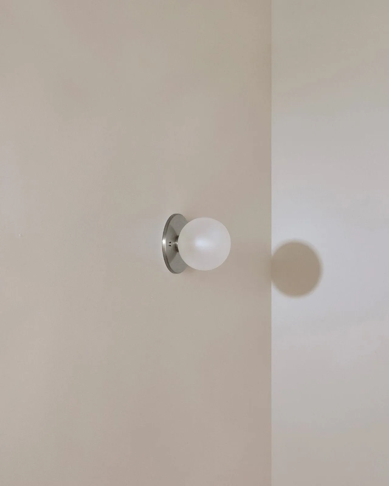 Minimalist Metal and Glass Orb Wall Light