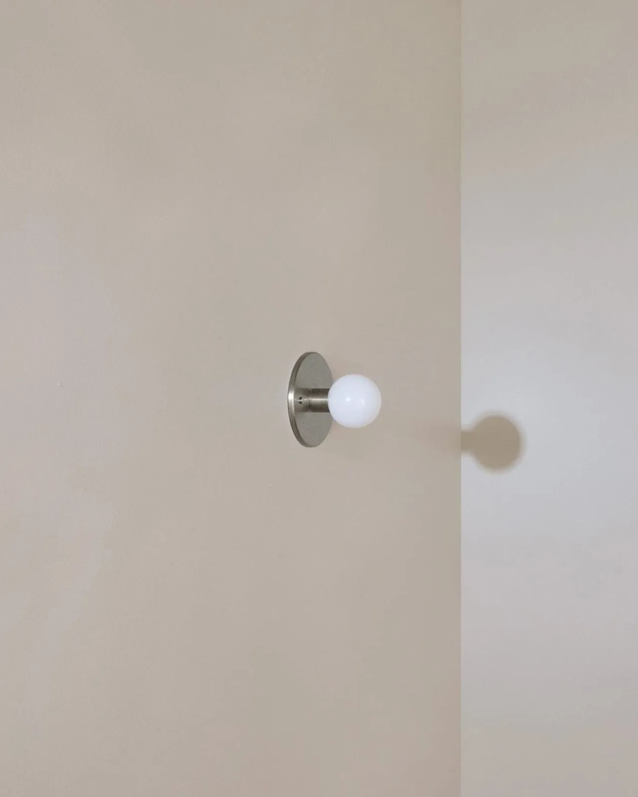 Minimalist Metal and Glass Orb Wall Light