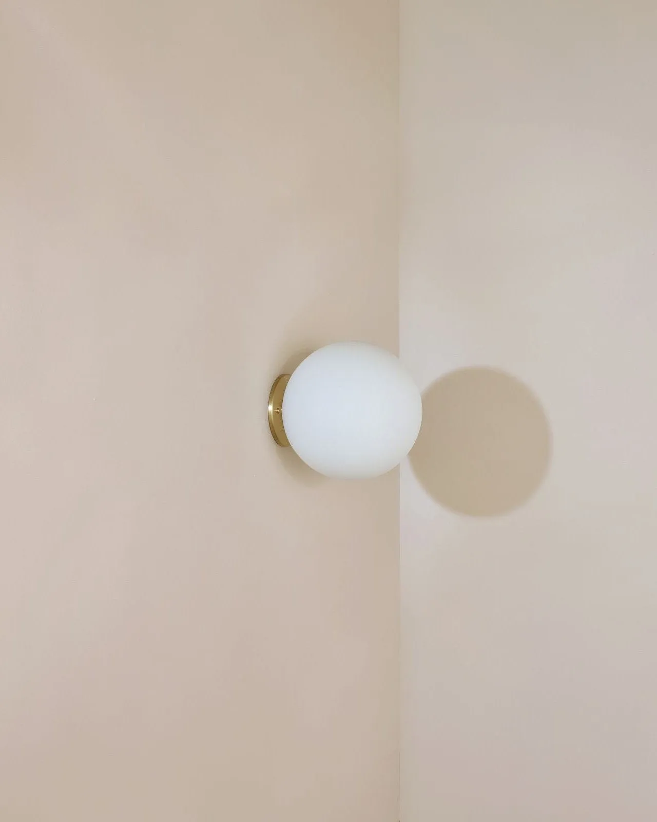Minimalist Metal and Glass Orb Wall Light