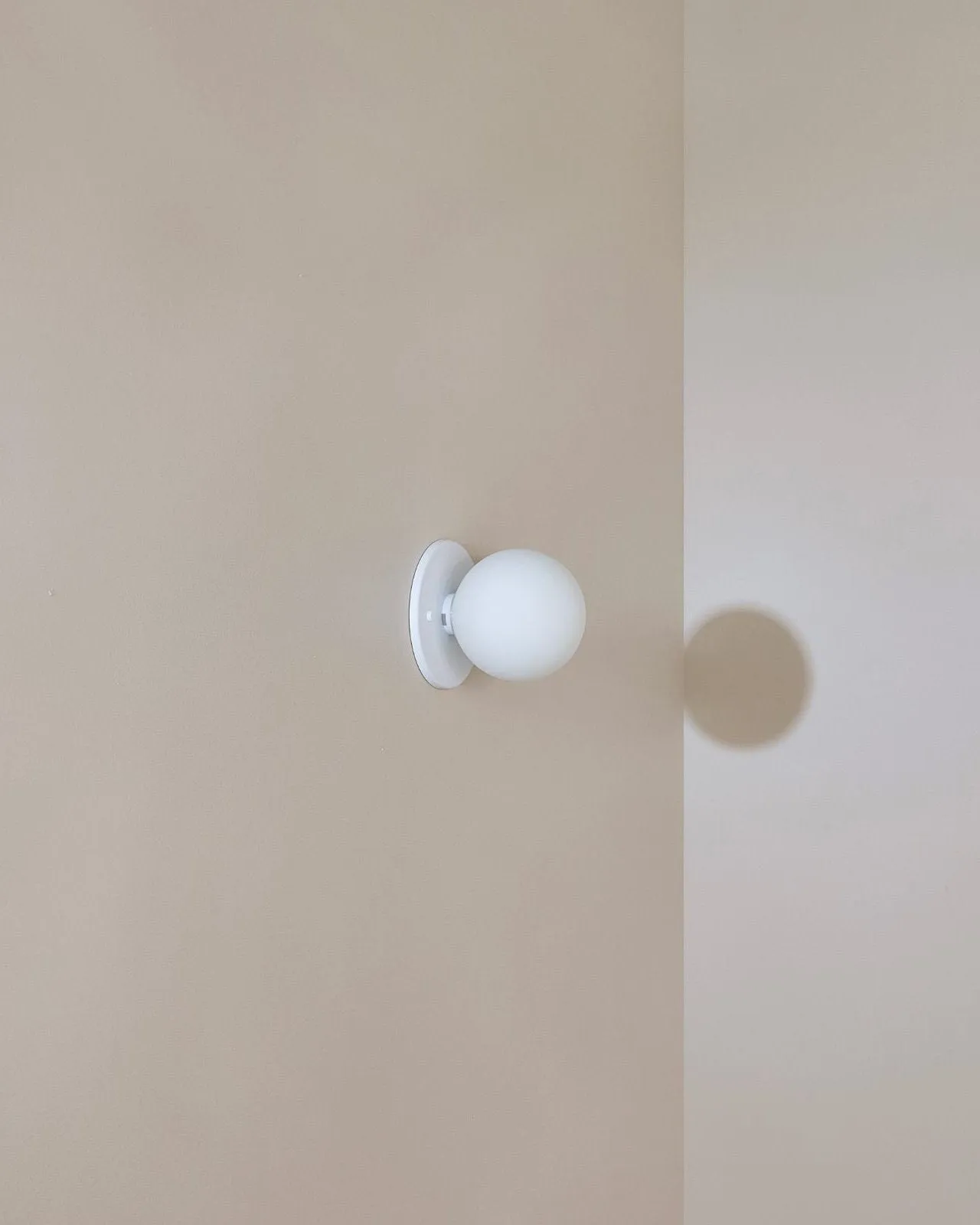 Minimalist Metal and Glass Orb Wall Light