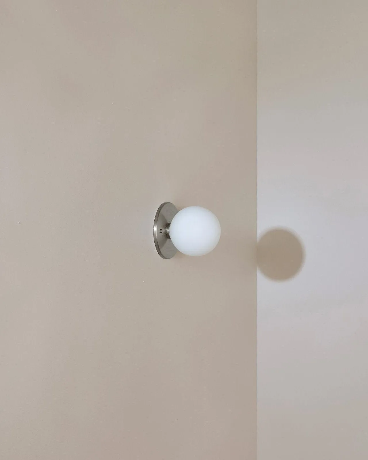 Minimalist Metal and Glass Orb Wall Light