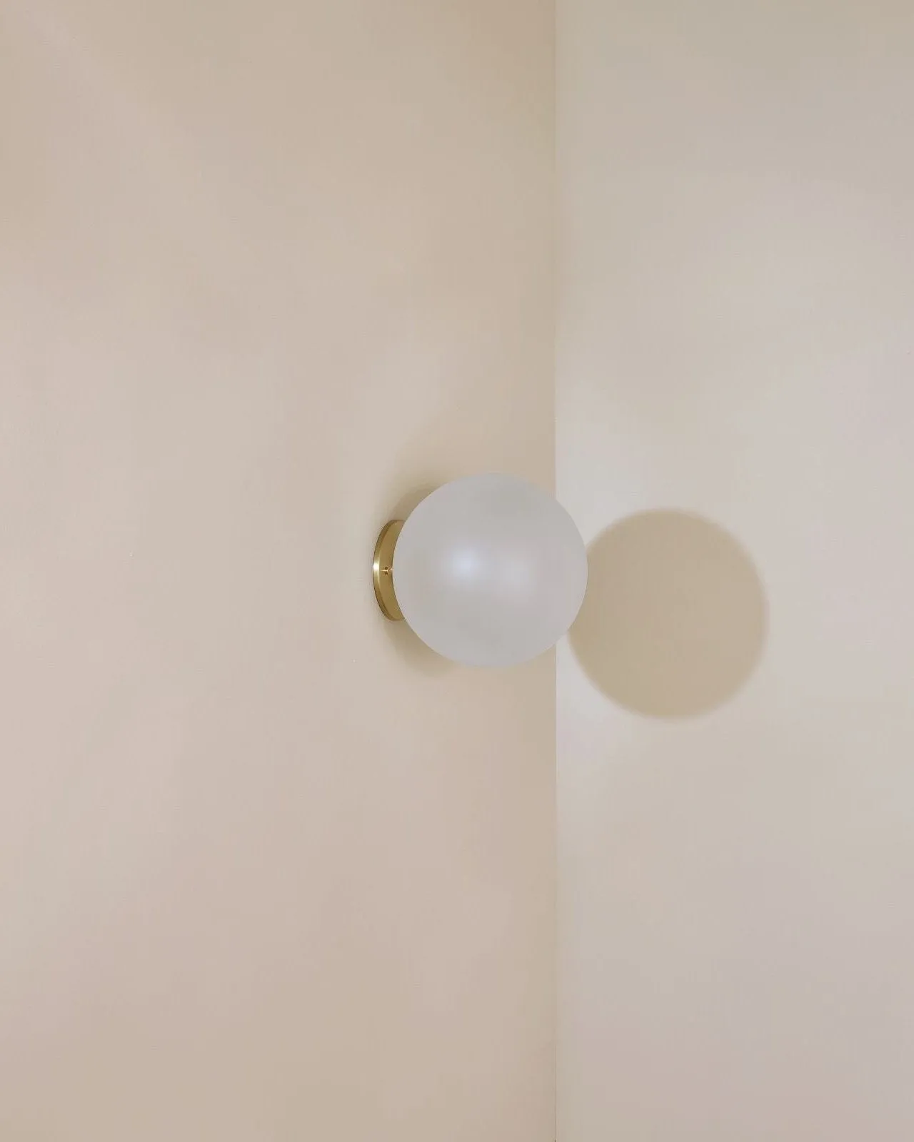 Minimalist Metal and Glass Orb Wall Light