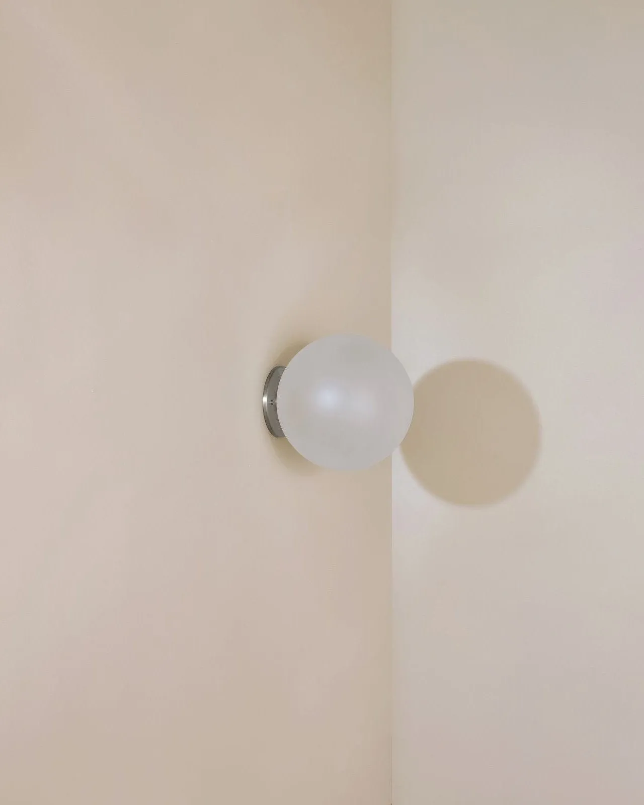 Minimalist Metal and Glass Orb Wall Light