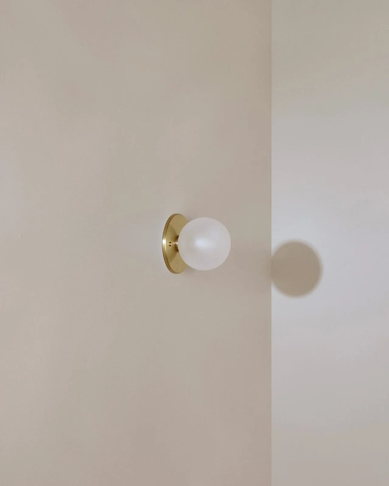 Minimalist Metal and Glass Orb Wall Light