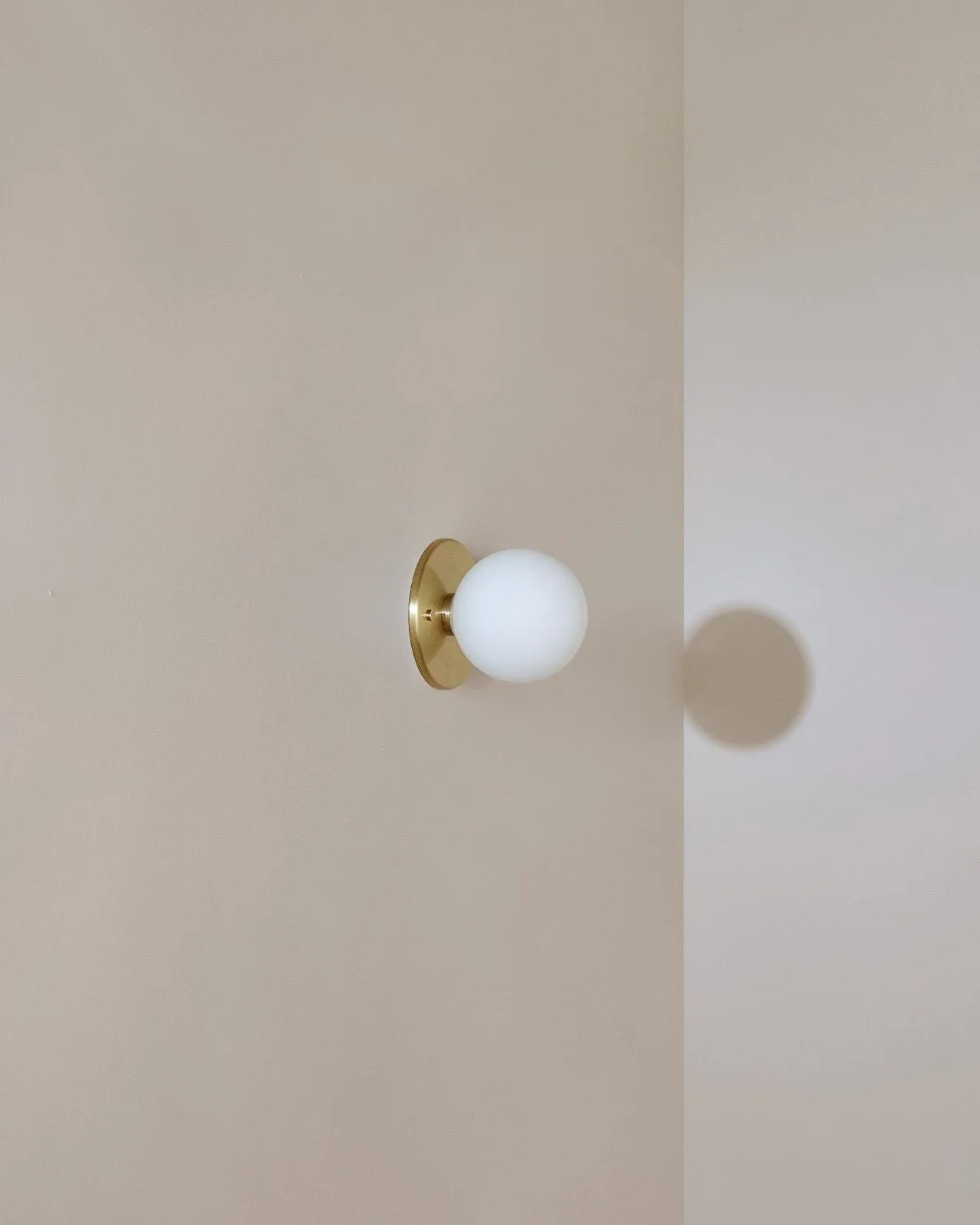 Minimalist Metal and Glass Orb Wall Light