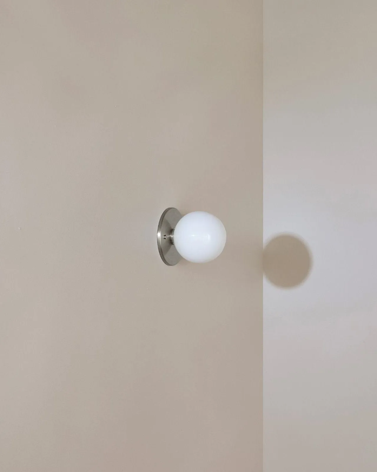Minimalist Metal and Glass Orb Wall Light