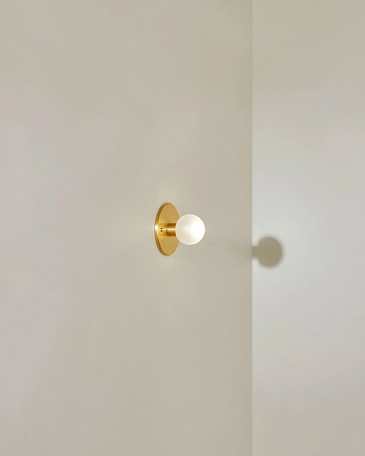 Minimalist Metal and Glass Orb Wall Light
