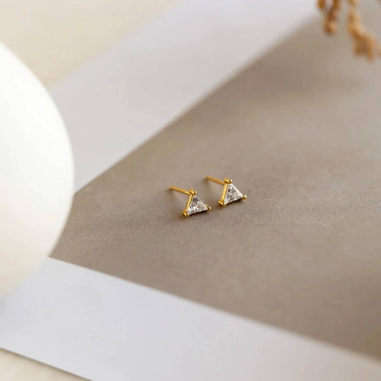 That's the Point Triangle Zircon Ear Studs